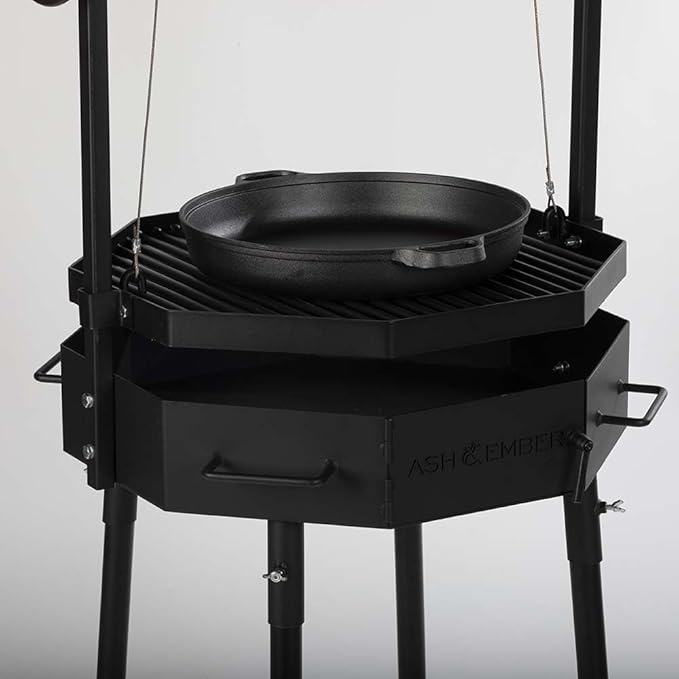 TITAN GREAT OUTDOORS Ash & Ember Santa Maria Grill, Argentine Style Open Fire Grill, Adjustable Cooking Grate with Flywheel, BBQ Grill Comes with Cast Iron Skillet