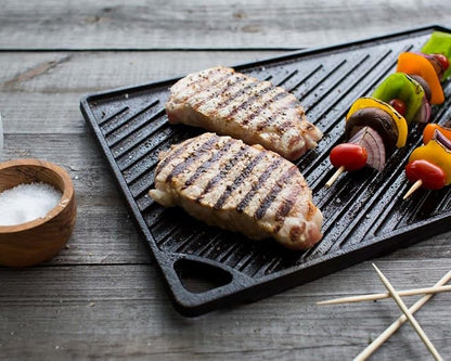 Lodge Reversible Cast Iron Grill/Griddle – 9.5 x 16.75 Inch Pre-Seasoned Cooking Surface – Flat & Ribbed Sides – Use on Stove, Grill, or Campfire – Made in the USA – Heavy-Duty, Black