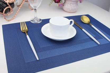 PIGCHCY Placemats,Washable Vinyl Woven Table Mats,Elegant Durable Placemats for Dining Table Set of 4 (18 x 12 inches, Navy Blue)