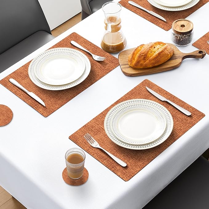 MOSAYT Placemats Set of 8, Heat Resistant Vinyl Place Mats with Coasters, Wipeable Washable 100% Waterproof Oil Proof Faux Leather Table Mats for Kitchen Dining Party Outdoor, 12" x 17", Orange