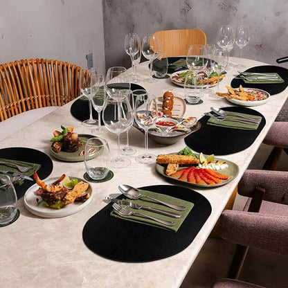 ADRIMER Placemats, Heat Resistant Oval Placemats Set of 4 Washable 12 x 17 Inch, Waterproof Table Mats, Wipeable Pu Place Mats for Kitchen, Dining Room, Black