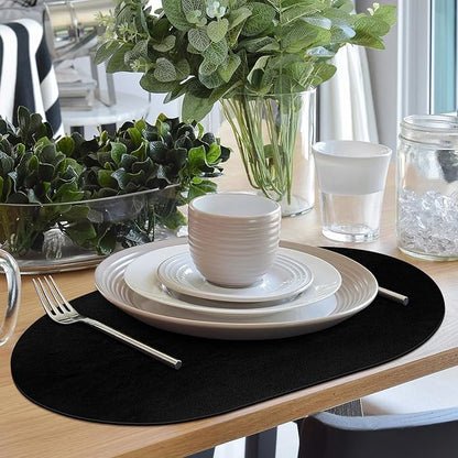 ADRIMER Placemats, Heat Resistant Oval Placemats Set of 12 Washable 12 x 17 Inch, Waterproof Table Mats, Wipeable Pu Place Mats for Kitchen, Dining Room, Black
